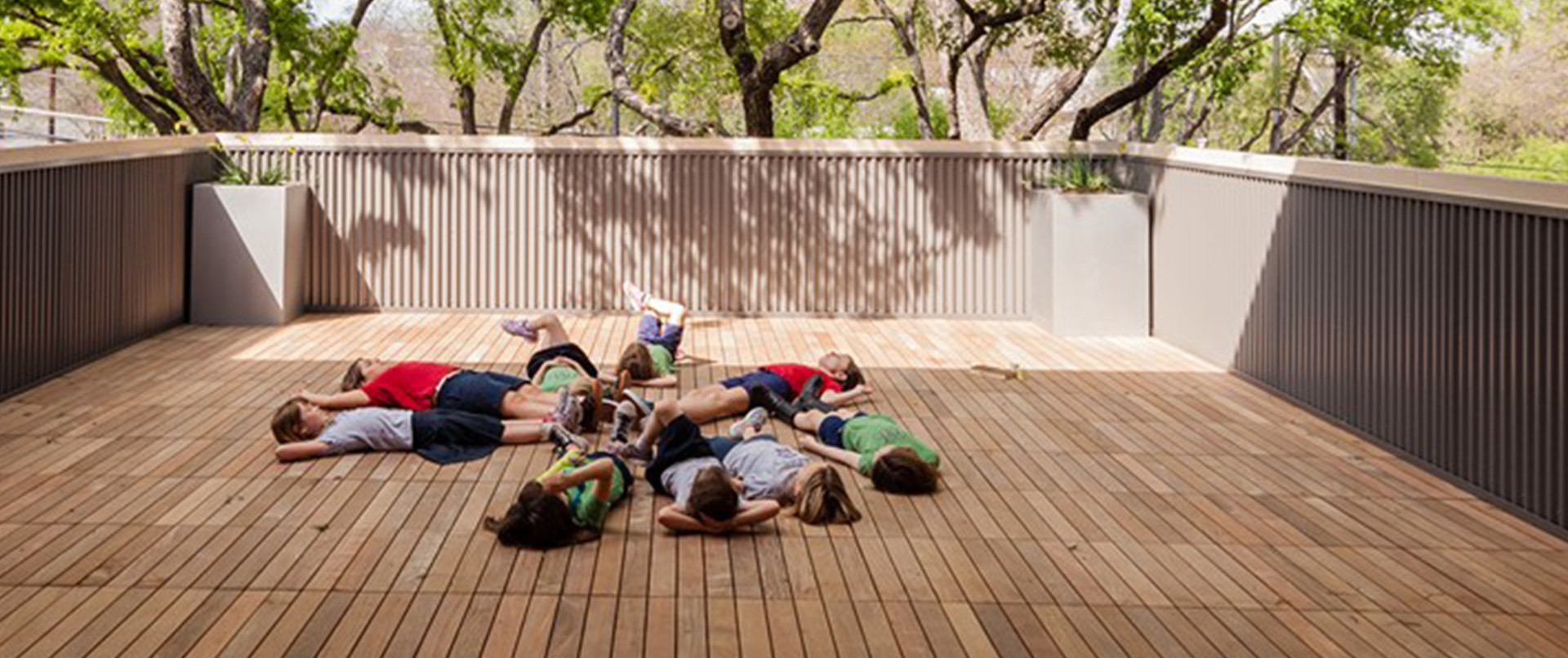 Girls Laying on Outdoor Rooftop Deck