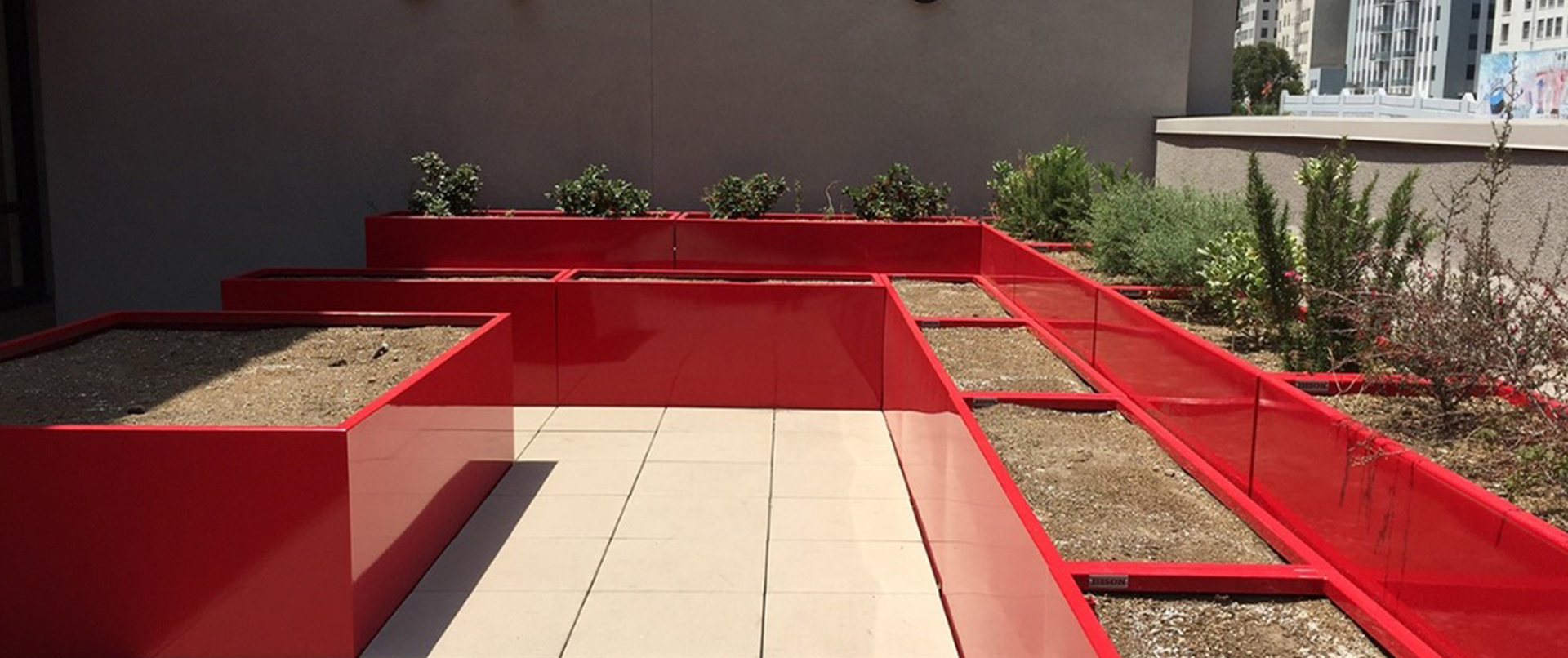 Rooftop with Bright Red Aluminum Cube Planters