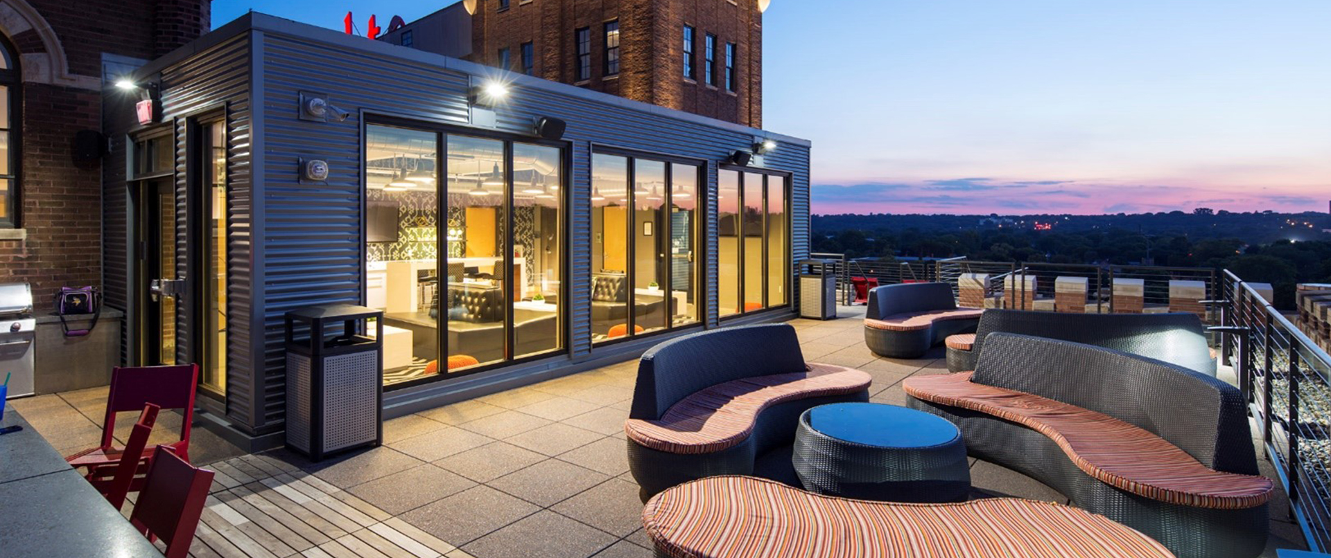 Rooftop Lounge Area with Sunset